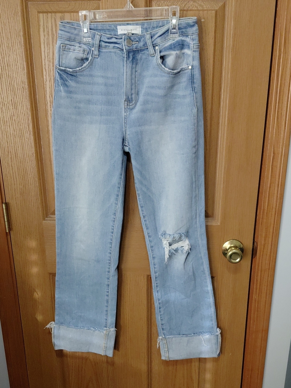 Light Wash Boot Cut Women’s Jeans with Distressed Knee